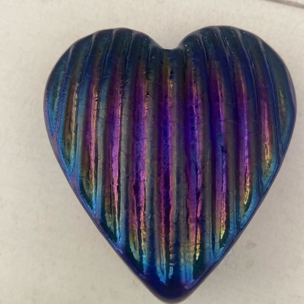 Signed heart paperweight.